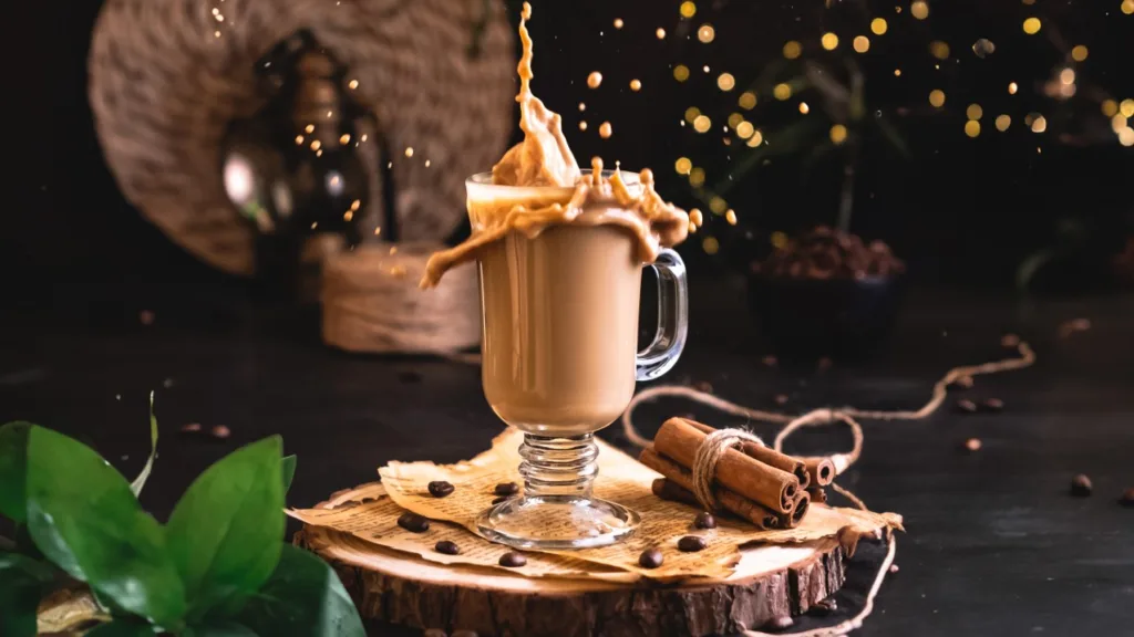 Iced coffee splash in a glass mug with cinnamon – drink splash photography by My Pinch of Wow, Dubai