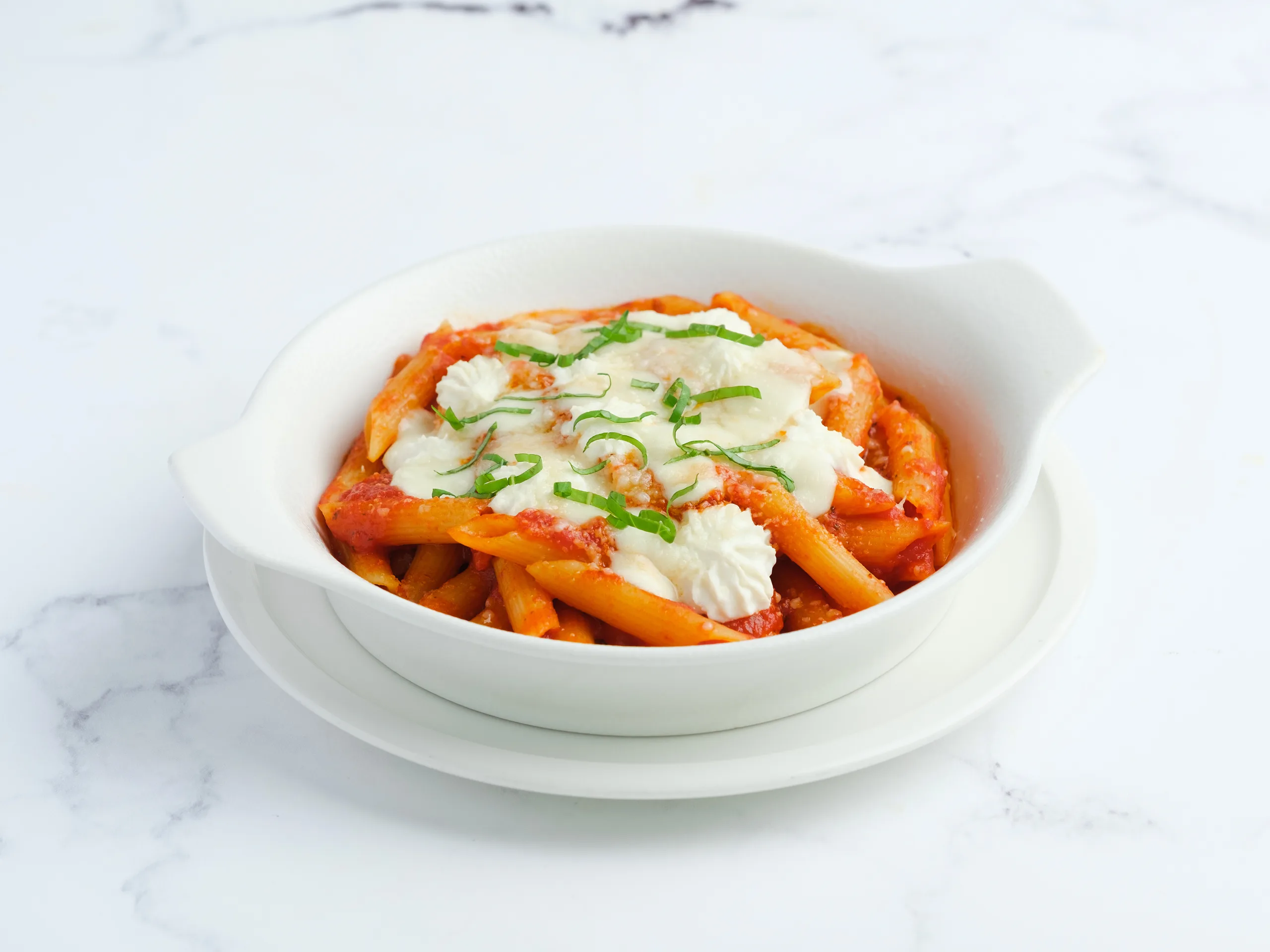 Cheesy penne pasta bake in a white bowl – restaurant menu photography by My Pinch of Wow, Dubai