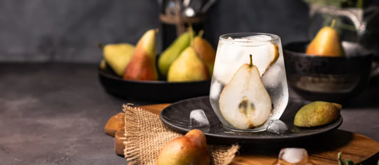 Poached pear in a glass with fresh pears – dark, moody dessert photography by My Pinch of Wow, Dubai